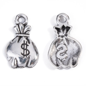 Detail view of vintage silver money bag charms with dollar signs for DIY jewelry making