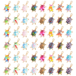 Colorful turtle sea animal charms in gold alloy with diverse artistic patterns