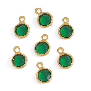 Detail of round green faceted glass charms with gold-plated copper edges and hanging loops