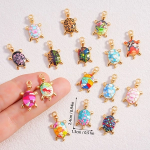 Set of colorful turtle charms in assorted floral and leopard patterns with enamel finish