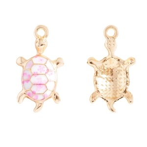 Detailed front and back view of a gold sea turtle charm with pink floral enamel finish