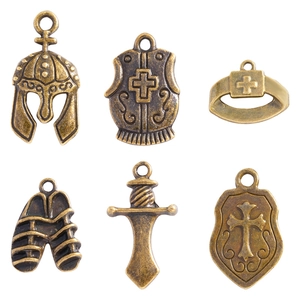Antique bronze alloy armor and weapon pendant set with vintage embossed details