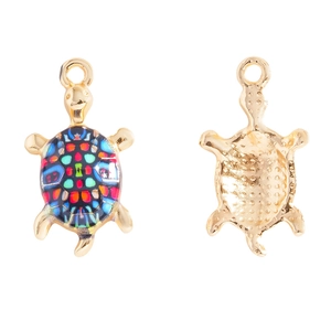 Detailed front and back view of colorful turtle charms with vibrant enamel patterns