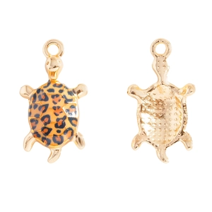 Detail of leopard print turtle pendant with golden metal back and top hanging ring