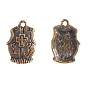 Detailed macro view of antique bronze alloy knight vest pendants with embossed crosses