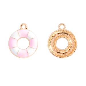 Detail view of lifebuoy DIY charms showing pink enamel front and golden textured metal back