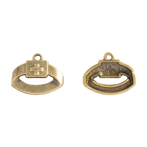 Detailed macro view of antique bronze alloy knight helmet pendants with cross relief design