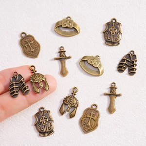 Antique bronze alloy knights armor pendants set including helmet shield and sword charms