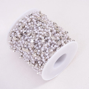 DIY decorative chain with 3mm faux pearls and silver star beads on a spool for jewelry