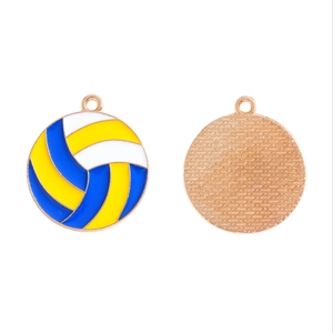 Detail view showing front and back of enamel volleyball charms for DIY jewelry