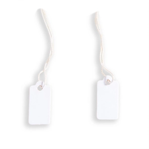 Detail of white rectangular paper hang tags with strings and pre-drilled holes