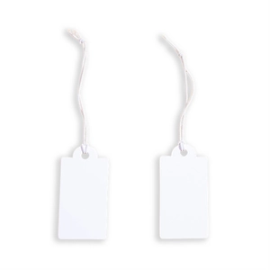 Close-up of blank white rectangular paper hang tags with cotton strings for labeling