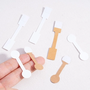 Self-adhesive kraft and white jewelry price tags for rings, necklaces, and bracelets