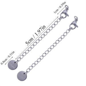 Macro detail of 5cm stainless steel extender chains with lobster clasp and S.steel tag