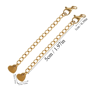 Detail view of 5cm gold stainless steel jewelry extension chains with lobster clasps