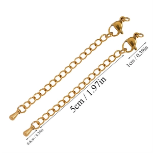 Detailed view of 5cm gold stainless steel extension chain with lobster clasp and drop charm