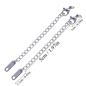 Detail of 5cm stainless steel extender chains with lobster clasps and S.Steel tags