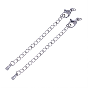 Close-up of silver stainless steel extender chains with lobster clasps and teardrop pendants
