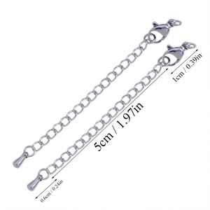 Detailed view of 5cm stainless steel extender chains with lobster clasp and drop charms