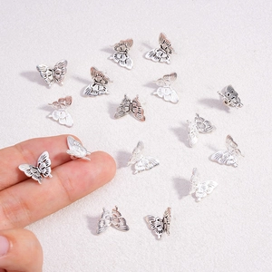 Vintage silver zinc alloy 3D butterfly spacer beads for DIY jewelry and nail art crafts