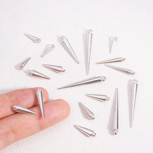 Silver CCB plastic cone spike charms in various sizes for DIY punk jewelry making