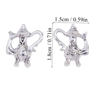 Detailed macro view of 1.5x1.8cm 3D silver teapot pendants with vintage embossed texture