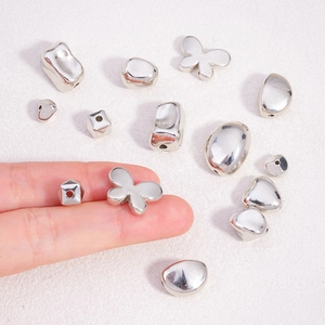 DIY silver CCB plastic beads in butterfly and geometric shapes for handmade jewelry