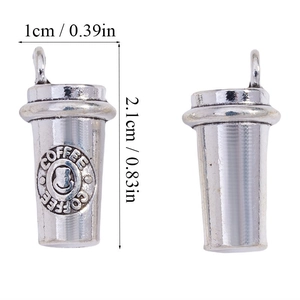 Detailed macro view showing the front and back of coffee cup metal charms for DIY jewelry