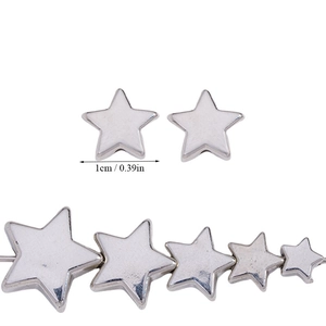 Detailed size comparison of golden star beads showing a 1cm diameter measurement guide