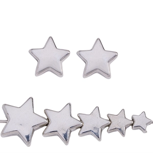 Detailed view of silver star beads in various sizes for DIY jewelry necklace making