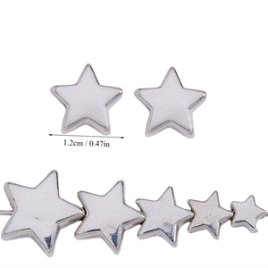 Macro detail of 12mm silver star CCB spacer beads for DIY jewelry making and crafts