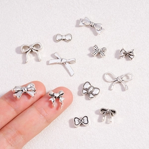 Retro zilveren legering strikbedels en kralen voor het maken van DIY-sieraden