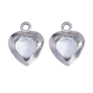 Detailed close-up of heart-shaped glass pendants with stainless steel frames for DIY jewelry