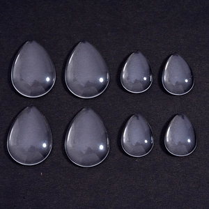 Clear teardrop glass cabochons in various sizes for DIY jewelry making and craft supplies