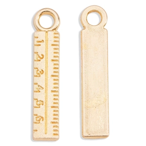 Detailed close-up of golden alloy ruler charms with precise scale engravings for DIY jewelry