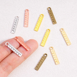 Miniature alloy ruler charms in gold, silver, and bronze for DIY jewelry crafting