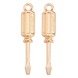 Detailed macro view of two golden screwdriver alloy charms with top hanging loops