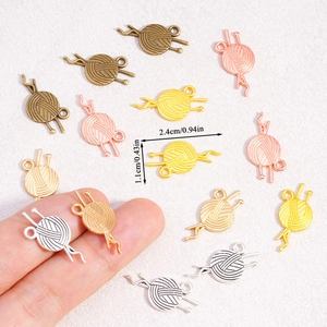 Alloy yarn ball charms with knitting needles for DIY jewelry in multiple metal colors