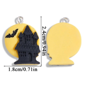 Gothic Halloween resin pendant featuring a black castle and bats over a yellow moon