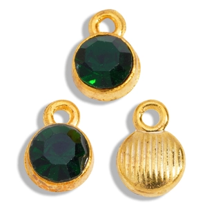 Detail of round dark green birthstone charms with gold plated settings for DIY jewelry