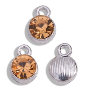 Close-up of champagne crystal alloy pendants showing front facets and textured back