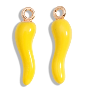 Close-up of bright yellow chili pepper charms with golden loops for jewelry making