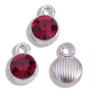 Macro view showing the front and textured back of a red rhinestone alloy pendant