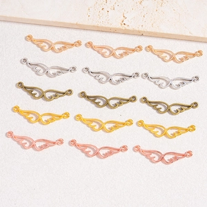 DIY alloy hollow wing pendants in five metallic finishes for handmade jewelry making