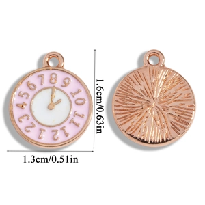 Detailed macro view of pink enamel clock charms with rose gold alloy plating and back texture