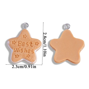 Detailed view of star shaped resin cookie pendant with Best Wishes text and silver ring