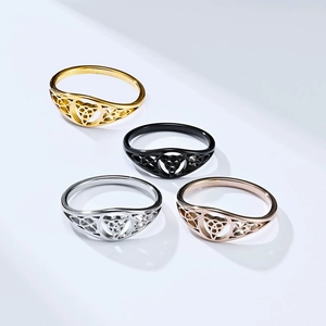 Triquetra Celtic knot stainless steel rings in gold, silver, black, and rose gold
