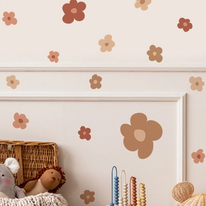 Detail view of cartoon flower wall stickers in earthy tones for kids room wall decor