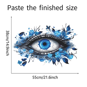 Detail showing blue eye wall sticker with flowers and butterflies measuring 55x38cm