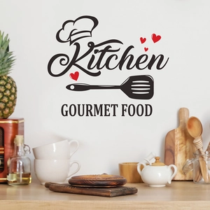Detail of kitchen wall sticker with Kitchen text, chef hat, and heart for home decor